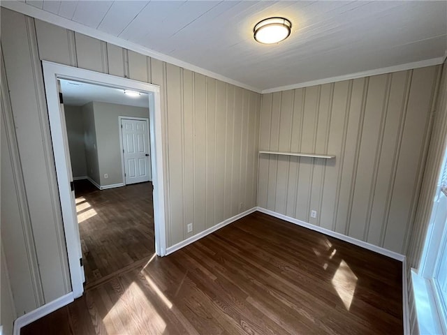1929 Hazelwood Dr SE, Marietta, GA 30067 - spare room featuring ornamental molding and dark wood finished floors