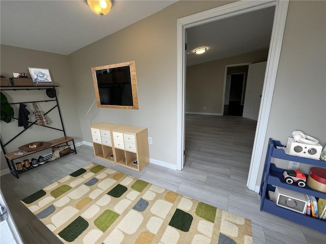 1929 Hazelwood Dr SE, Marietta, GA 30067 - living room with light wood-style flooring and lofted ceiling