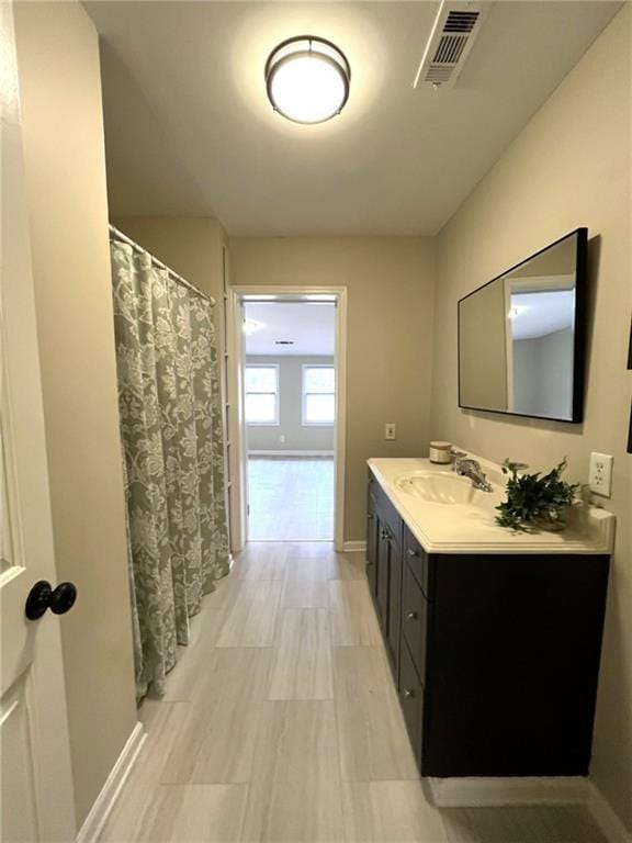 1929 Hazelwood Dr SE, Marietta, GA 30067 - full bath featuring vanity and baseboards