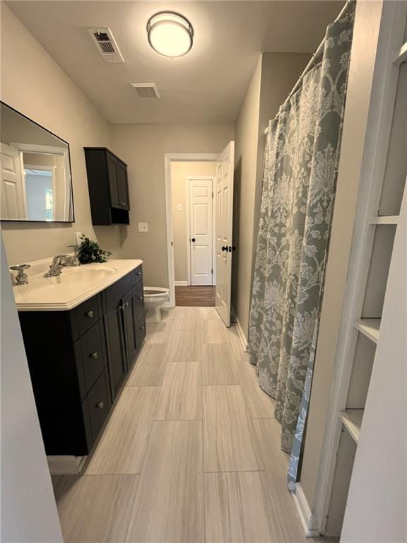 1929 Hazelwood Dr SE, Marietta, GA 30067 - bathroom featuring vanity and a shower with curtain