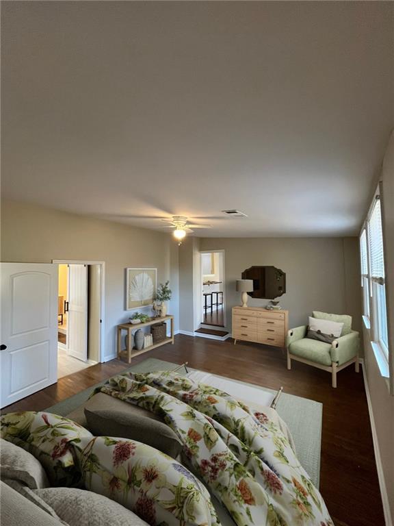 1929 Hazelwood Dr SE, Marietta, GA 30067 - bedroom with wood finished floors and a ceiling fan