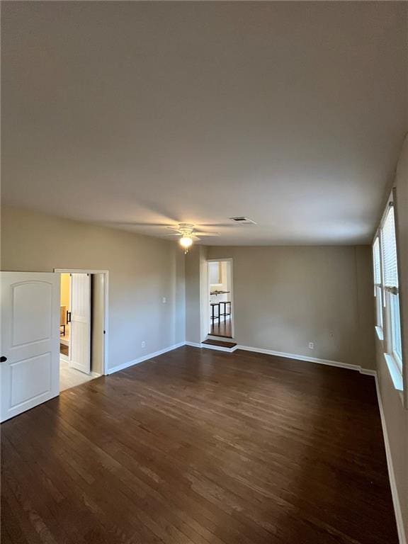 1929 Hazelwood Dr SE, Marietta, GA 30067 - spare room with dark wood-type flooring and a ceiling fan