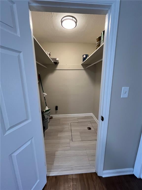 1929 Hazelwood Dr SE, Marietta, GA 30067 - walk in closet featuring wood finished floors