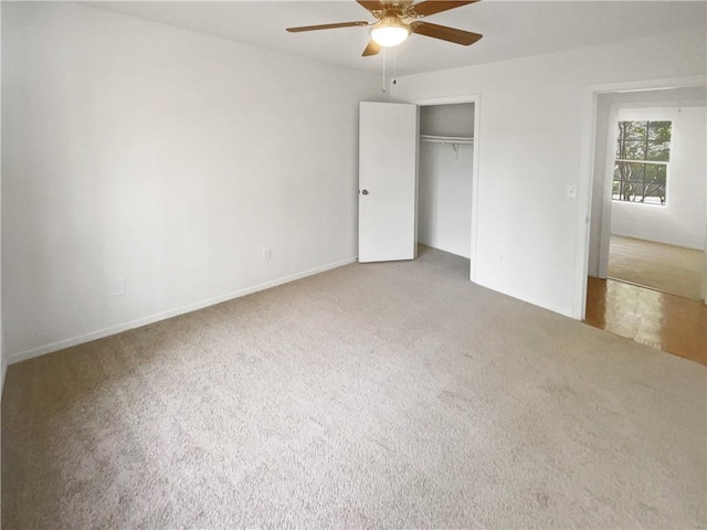 4727 Garden Hills Dr, Stone Mountain, GA 30083 - unfurnished bedroom featuring carpet floors, a closet, and a ceiling fan