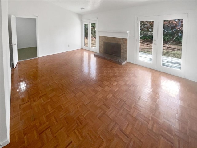 4727 Garden Hills Dr, Stone Mountain, GA 30083 - unfurnished living room with french doors and a fireplace