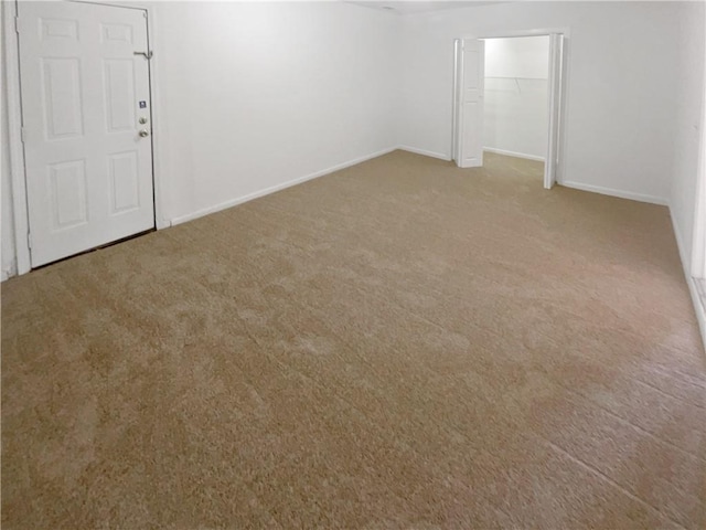 4727 Garden Hills Dr, Stone Mountain, GA 30083 - carpeted spare room with baseboards