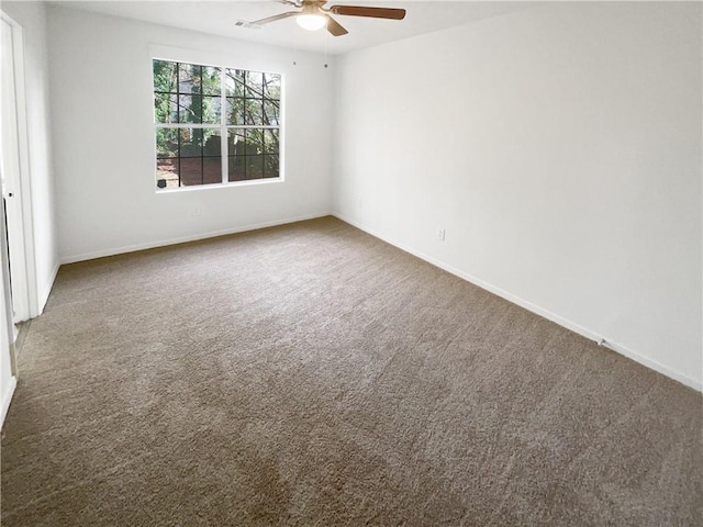 4727 Garden Hills Dr, Stone Mountain, GA 30083 - unfurnished room featuring ceiling fan and carpet flooring