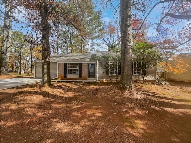 4727 Garden Hills Dr, Stone Mountain, GA 30083 - view of front of house featuring brick siding
