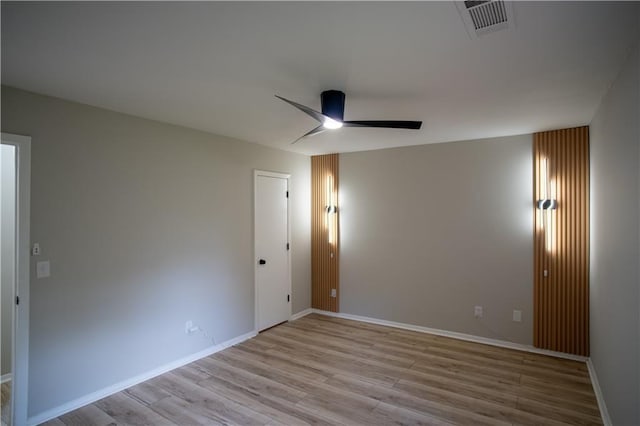 5072 Plantation View Trl, Stone Mountain, GA 30088 - unfurnished room with a ceiling fan, light wood-type flooring, and baseboards