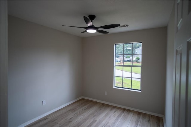 5072 Plantation View Trl, Stone Mountain, GA 30088 - spare room with light wood-type flooring, baseboards, and ceiling fan