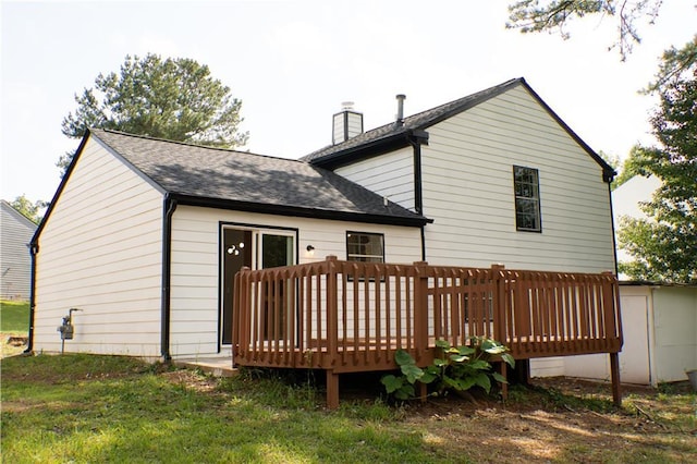 5072 Plantation View Trl, Stone Mountain, GA 30088 - back of house featuring roof with shingles, a wooden deck, and a chimney