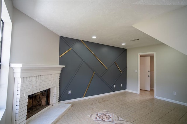 5072 Plantation View Trl, Stone Mountain, GA 30088 - unfurnished living room featuring a decorative wall, a brick fireplace, baseboards, and recessed lighting