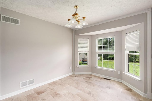 350 Dailey Mill Rd, Mcdonough, GA 30253 - unfurnished dining area with a chandelier and a textured ceiling