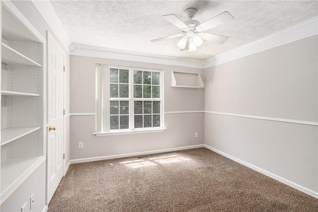 350 Dailey Mill Rd, Mcdonough, GA 30253 - carpeted spare room featuring crown molding, a ceiling fan, and a textured ceiling