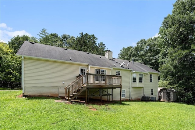 350 Dailey Mill Rd, Mcdonough, GA 30253 - back of property featuring a wooden deck, stairway, a chimney, and a yard