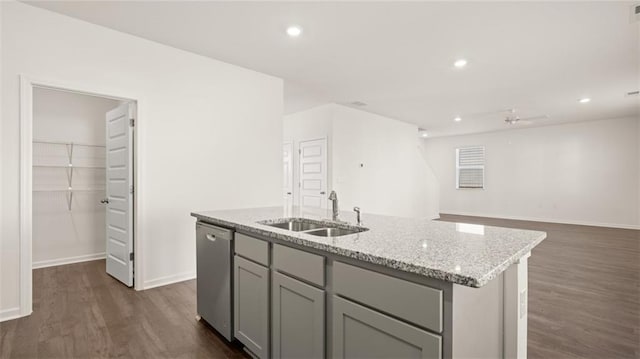 605 Lobelia Way, Locust Grove, GA 30248 - kitchen featuring a sink, dishwasher, dark wood-style floors, a kitchen island with sink, and gray cabinets