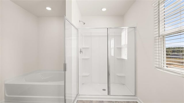 605 Lobelia Way, Locust Grove, GA 30248 - full bathroom with a stall shower, a bath, and recessed lighting