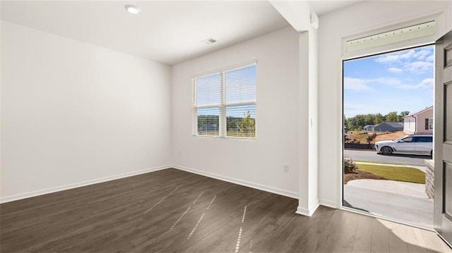 605 Lobelia Way, Locust Grove, GA 30248 - foyer featuring dark wood-style flooring and baseboards