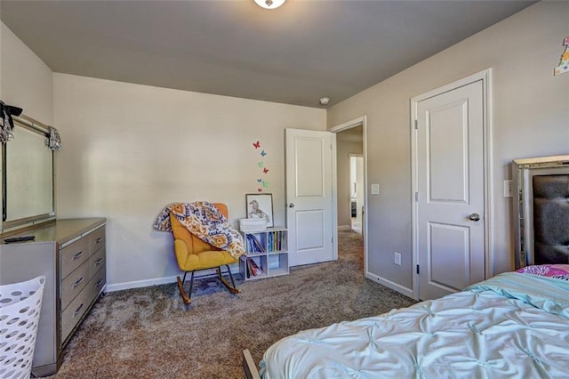 bedroom featuring baseboards and carpet flooring