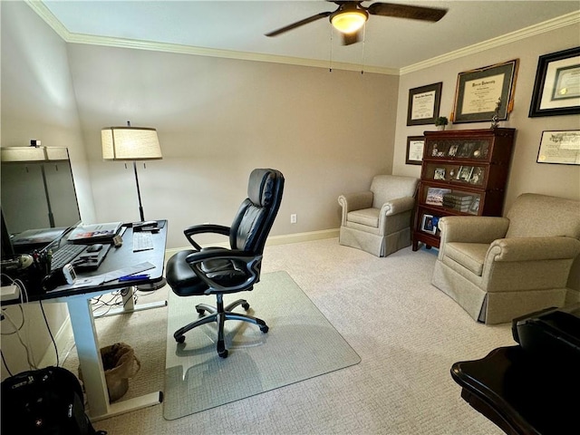 office featuring light carpet, ceiling fan, baseboards, and crown molding