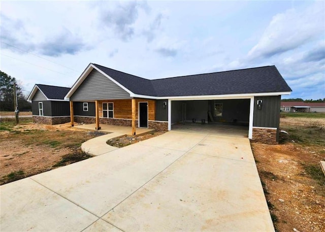 ranch-style home featuring a garage