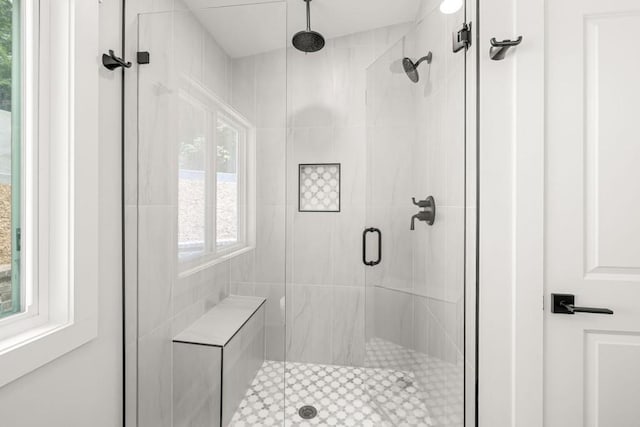 full bathroom featuring a stall shower