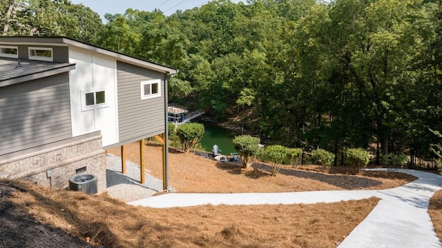 view of yard featuring central AC