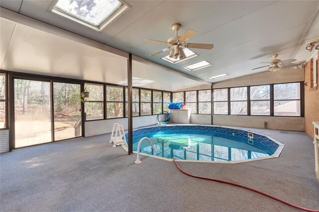 interior space with tile patterned flooring and a paneled ceiling