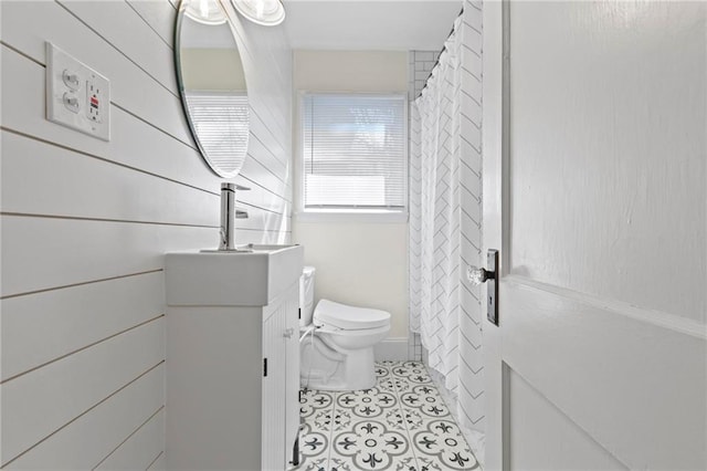 full bath with vanity, tile patterned flooring, and toilet