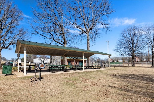 view of property's community featuring fence