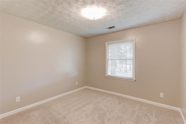 1980 Mcconnell Rd, Grayson, GA 30017 - carpeted empty room featuring baseboards and a textured ceiling
