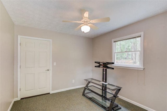 1980 Mcconnell Rd, Grayson, GA 30017 - exercise room with baseboards, carpet flooring, and a ceiling fan