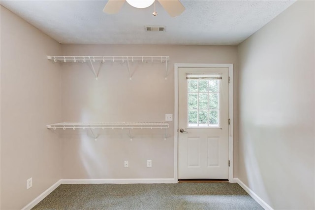 1980 Mcconnell Rd, Grayson, GA 30017 - doorway with carpet floors, baseboards, and ceiling fan