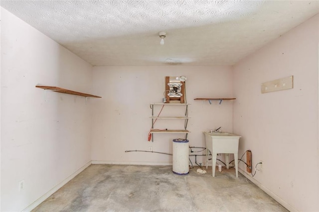 1980 Mcconnell Rd, Grayson, GA 30017 - basement featuring baseboards and a sink