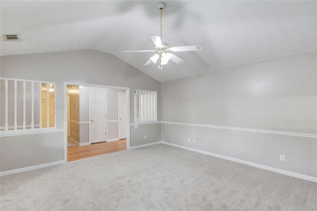 1980 Mcconnell Rd, Grayson, GA 30017 - carpeted spare room with ceiling fan, baseboards, and vaulted ceiling