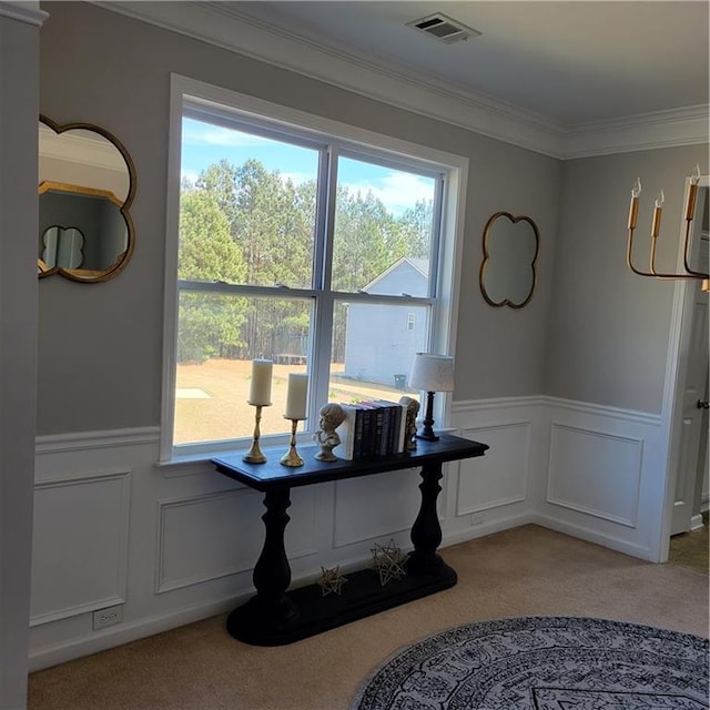 interior space with crown molding