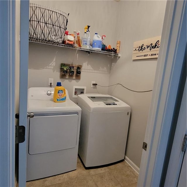 laundry area featuring separate washer and dryer