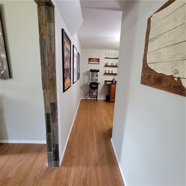 hallway featuring light hardwood / wood-style flooring