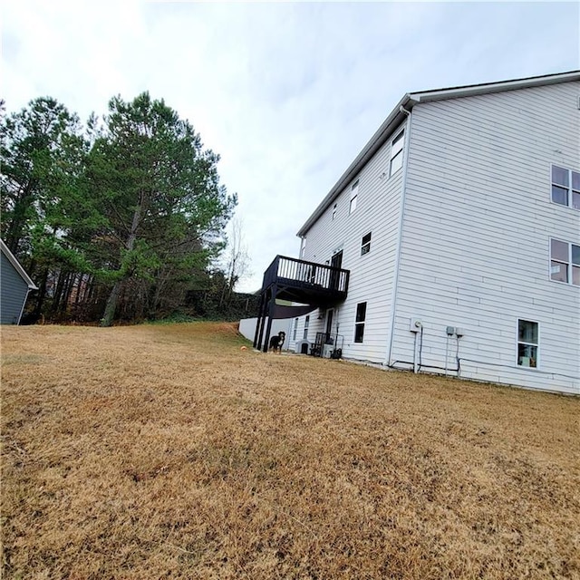 view of yard featuring a wooden deck