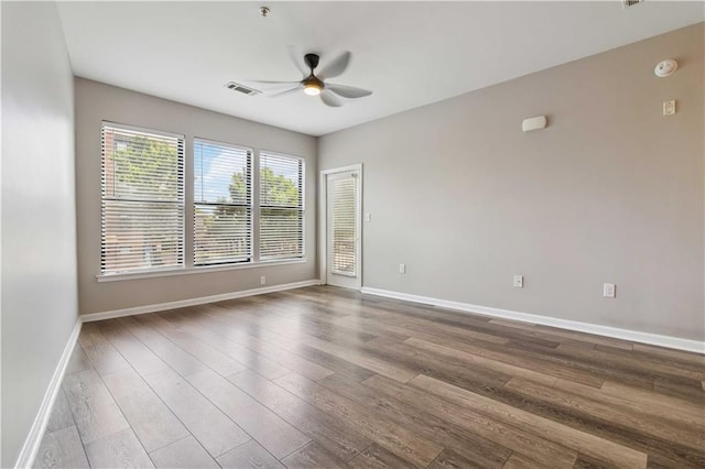 898 Oak St SW Unit 3228, Atlanta, GA 30310 - empty room with ceiling fan, wood finished floors, a smoke detector, and a pendent fire sprinkler