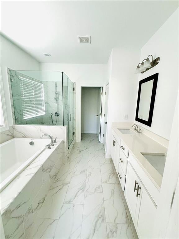 full bath with a garden tub, a sink, visible vents, marble finish floor, and a marble finish shower