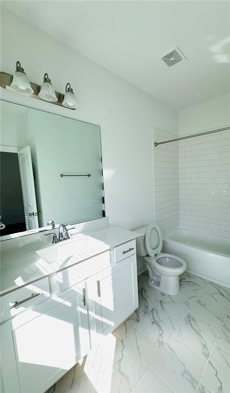 full bathroom with visible vents, toilet, marble finish floor, vanity, and washtub / shower combination