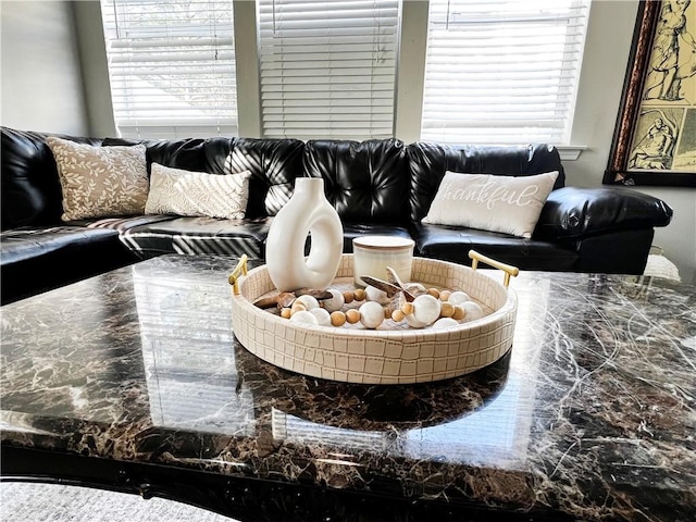 dining space with sink and a high ceiling