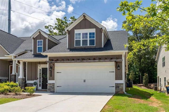 craftsman house featuring a garage