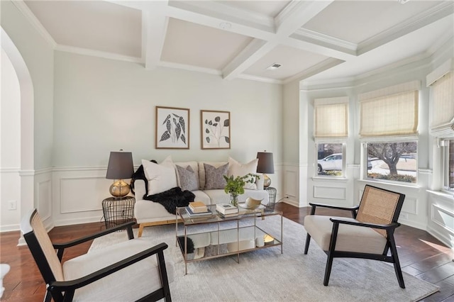 sitting room featuring beamed ceiling, coffered ceiling, and dark wood-type flooring