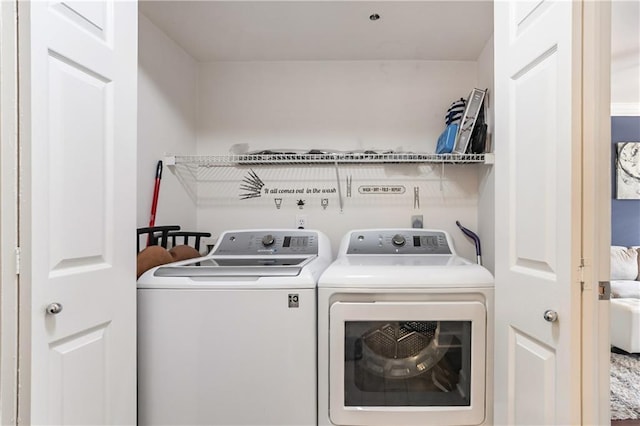 3777 Peachtree Rd NE Unit 1326, Atlanta, GA 30319 - laundry room with washing machine and dryer