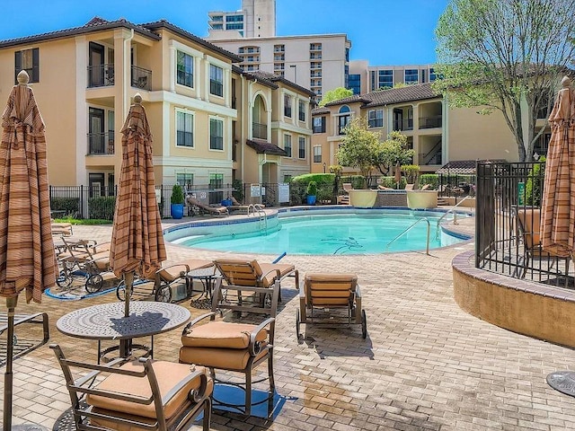 3777 Peachtree Rd NE Unit 1326, Atlanta, GA 30319 - community pool with a patio area
