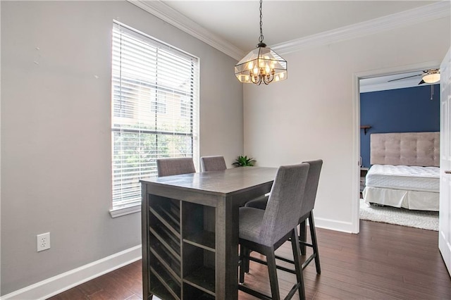 3777 Peachtree Rd NE Unit 1326, Atlanta, GA 30319 - dining area featuring a chandelier, crown molding, and dark wood-style floors