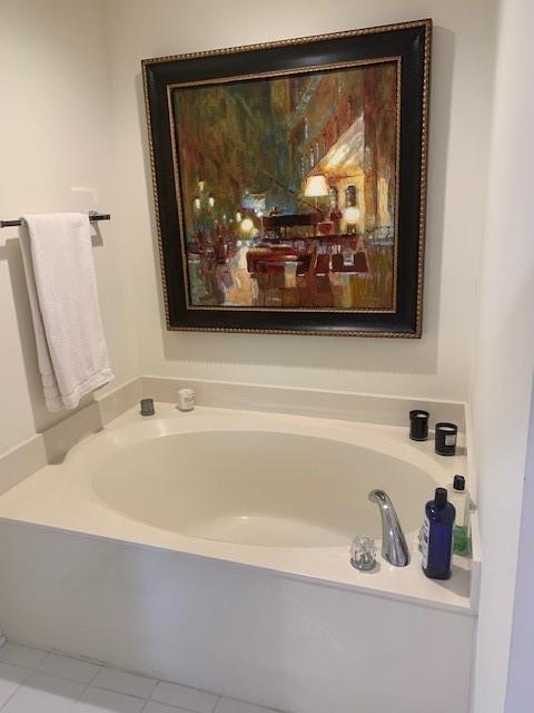 3636 Habersham Rd Unit 2307, Atlanta, GA 30305 - bathroom featuring tile patterned flooring and a garden tub