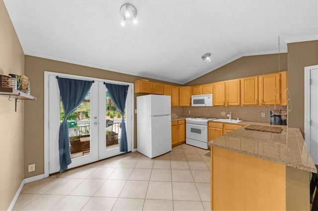 1822 N Rock Springs Rd NE Unit 24, Atlanta, GA 30324 - kitchen featuring white appliances, a peninsula, lofted ceiling, french doors, and light stone counters